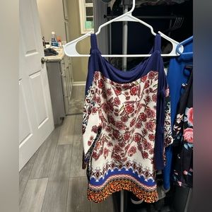 Super cute top with open/slit long sleeve